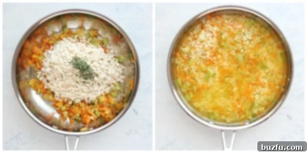 Making rice pilaf in a skillet. Vegetables, toasted rice, and savory stock simmering together in a skillet, developing rich flavors for the pilaf.