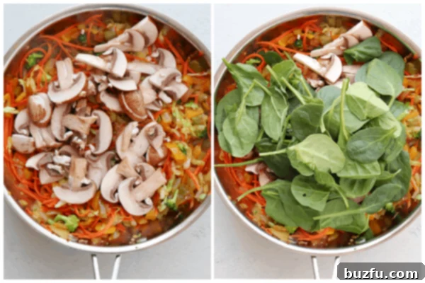 Mushrooms and spinach being added to the stir-fry pan, ready to wilt and cook down.