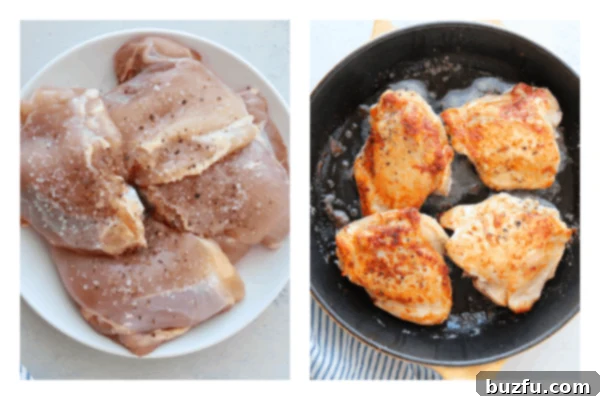 Close-up of chicken thighs browning in a hot skillet, developing a golden-brown crust.