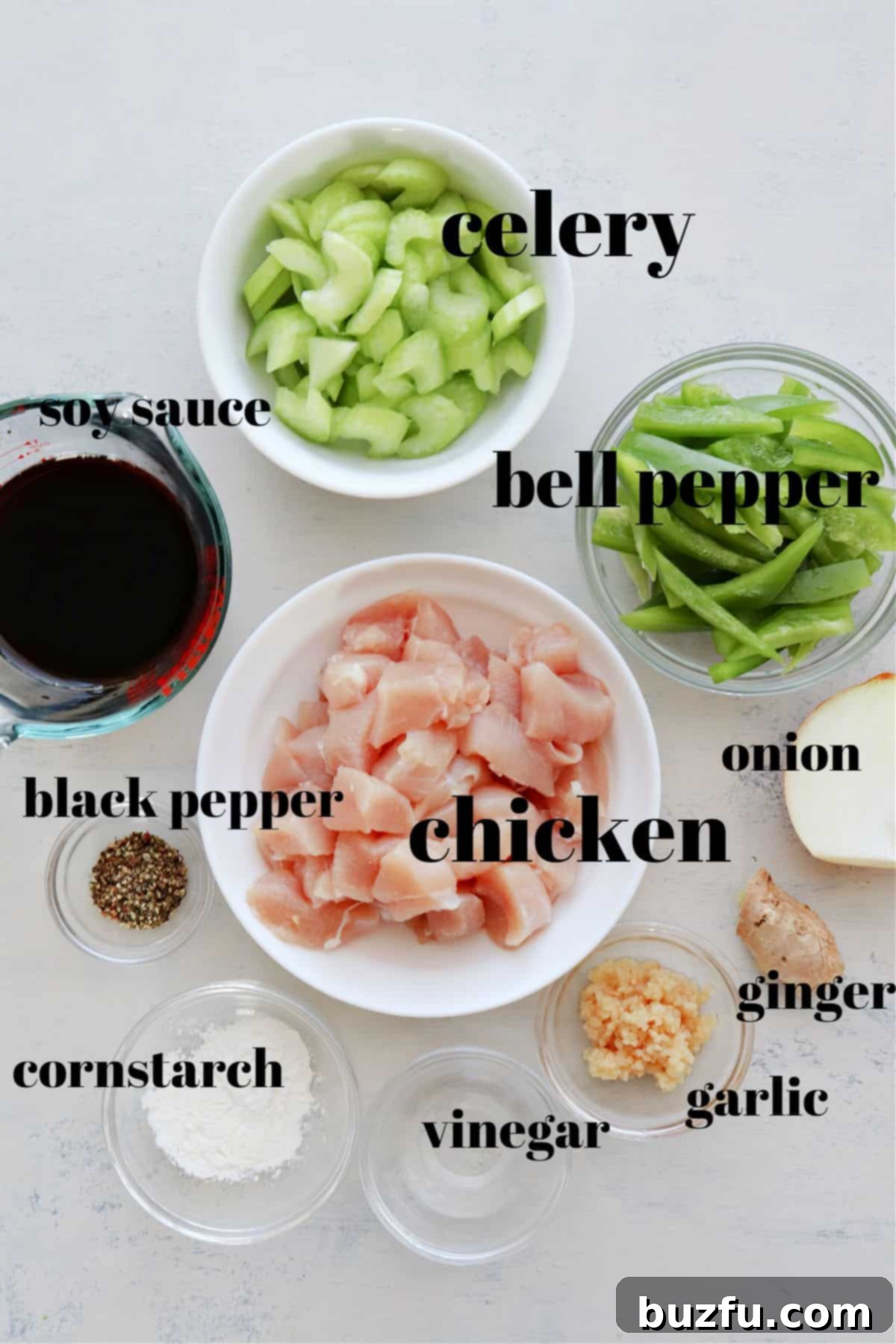Black Pepper Chicken ingredients Ingredients for black pepper chicken on a board.