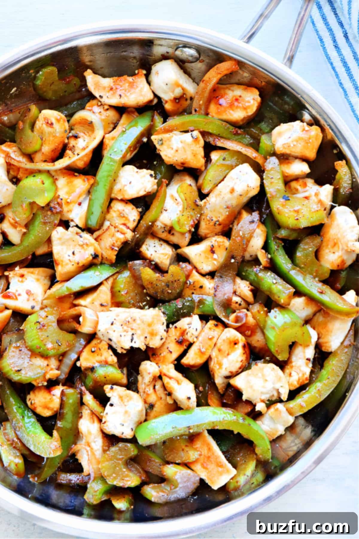 Easy Black Pepper Chicken from scratch Chicken and vegetables in skillet.