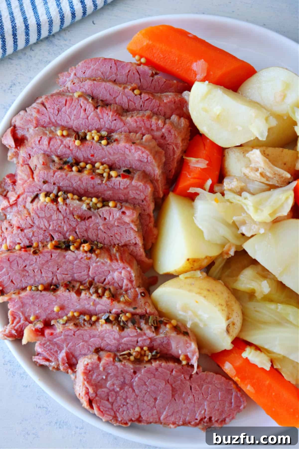 Sliced beef and vegetables on a platter.