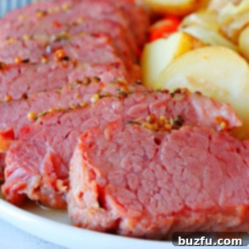 Corned beef with vegetables on a plate.
