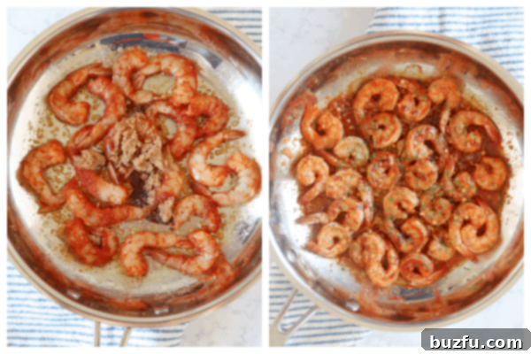 Cajun shrimp sizzling in a hot skillet with butter, garlic, and brown sugar, turning pink as they cook.