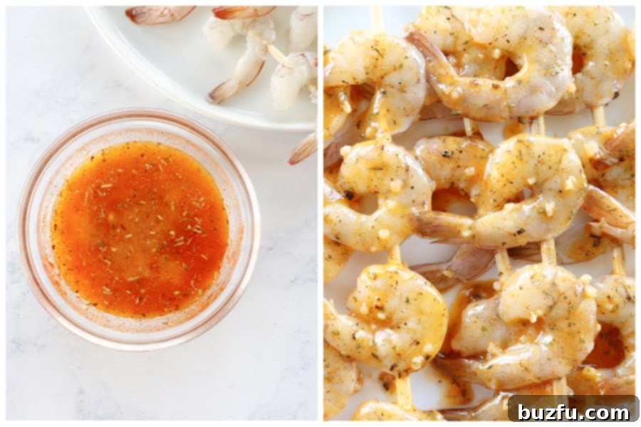 Melted butter with seasoning being brushed onto raw shrimp on skewers, ready for the grill.