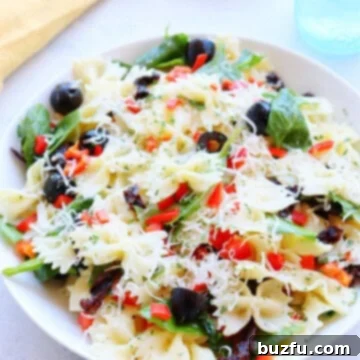 Rustic Tuscan Pasta Salad 3 Pasta salad in a white bowl.