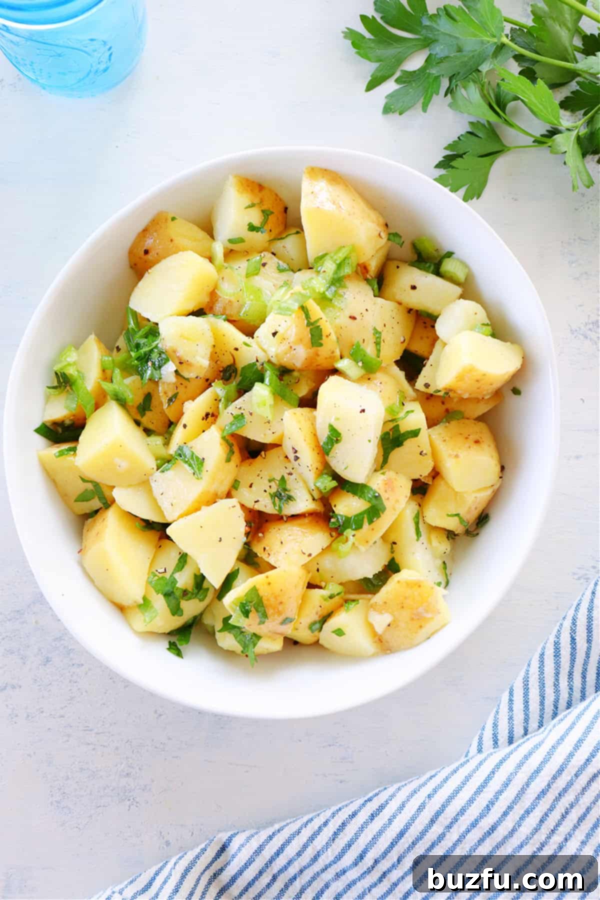 Overhead shot of potato salad in a bowl.
