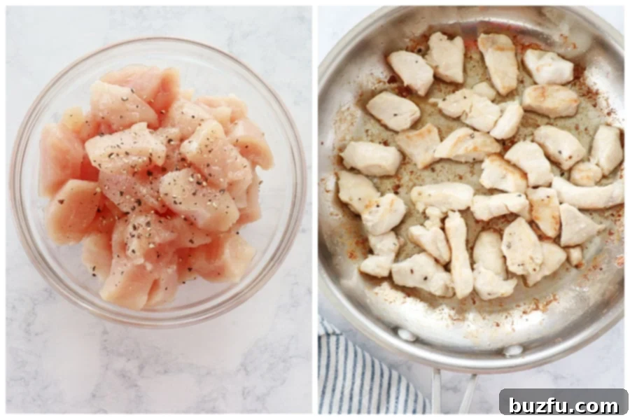 Bite-sized chicken pieces seasoned and ready in a bowl, with some already browning in a hot skillet.