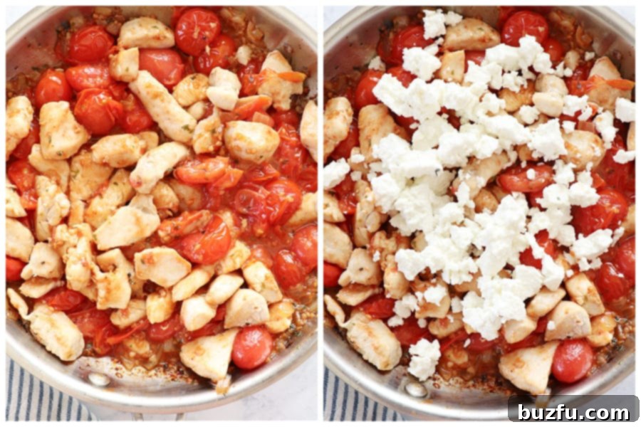 Cooked chicken and crumbled feta cheese being stirred into the tomato mixture in the skillet.