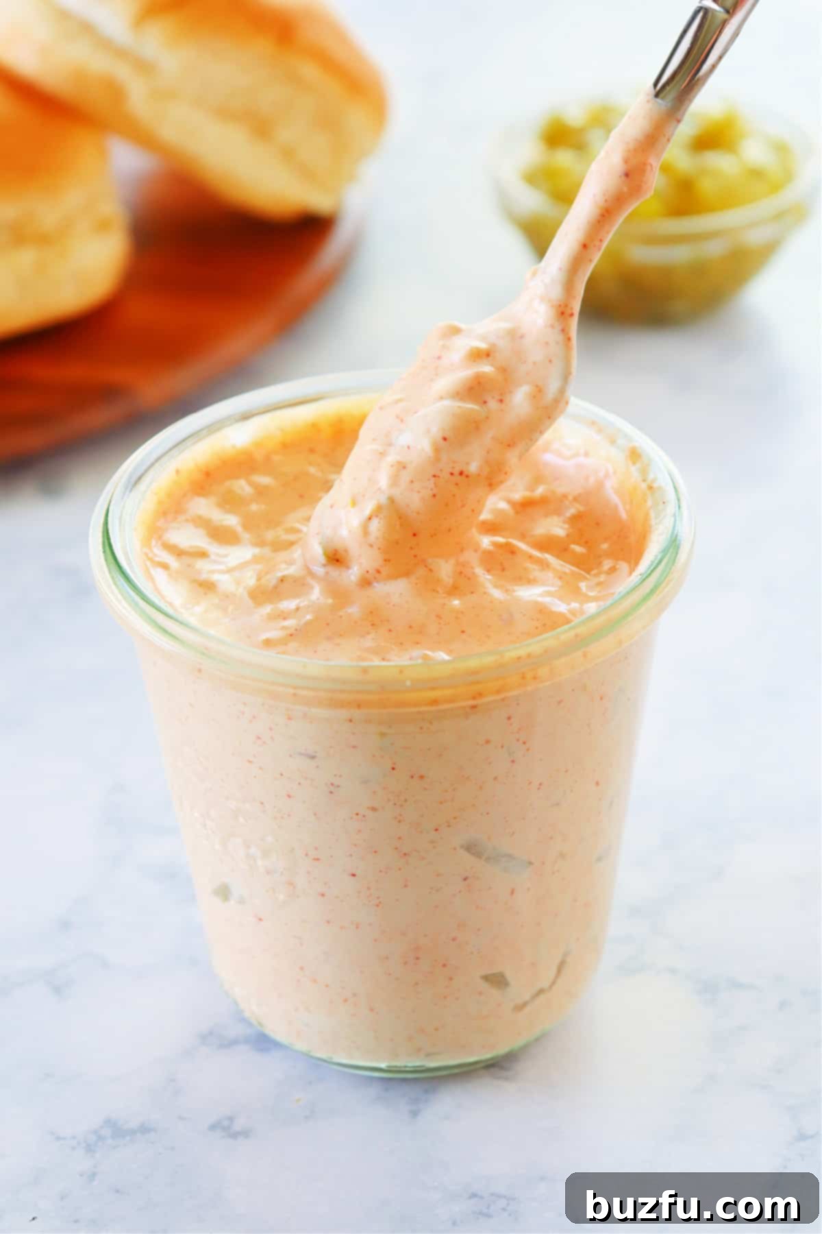 Homemade Big Mac Sauce copycat recipe Big Mac sauce in a clear glass jar, ready to be served or stored.