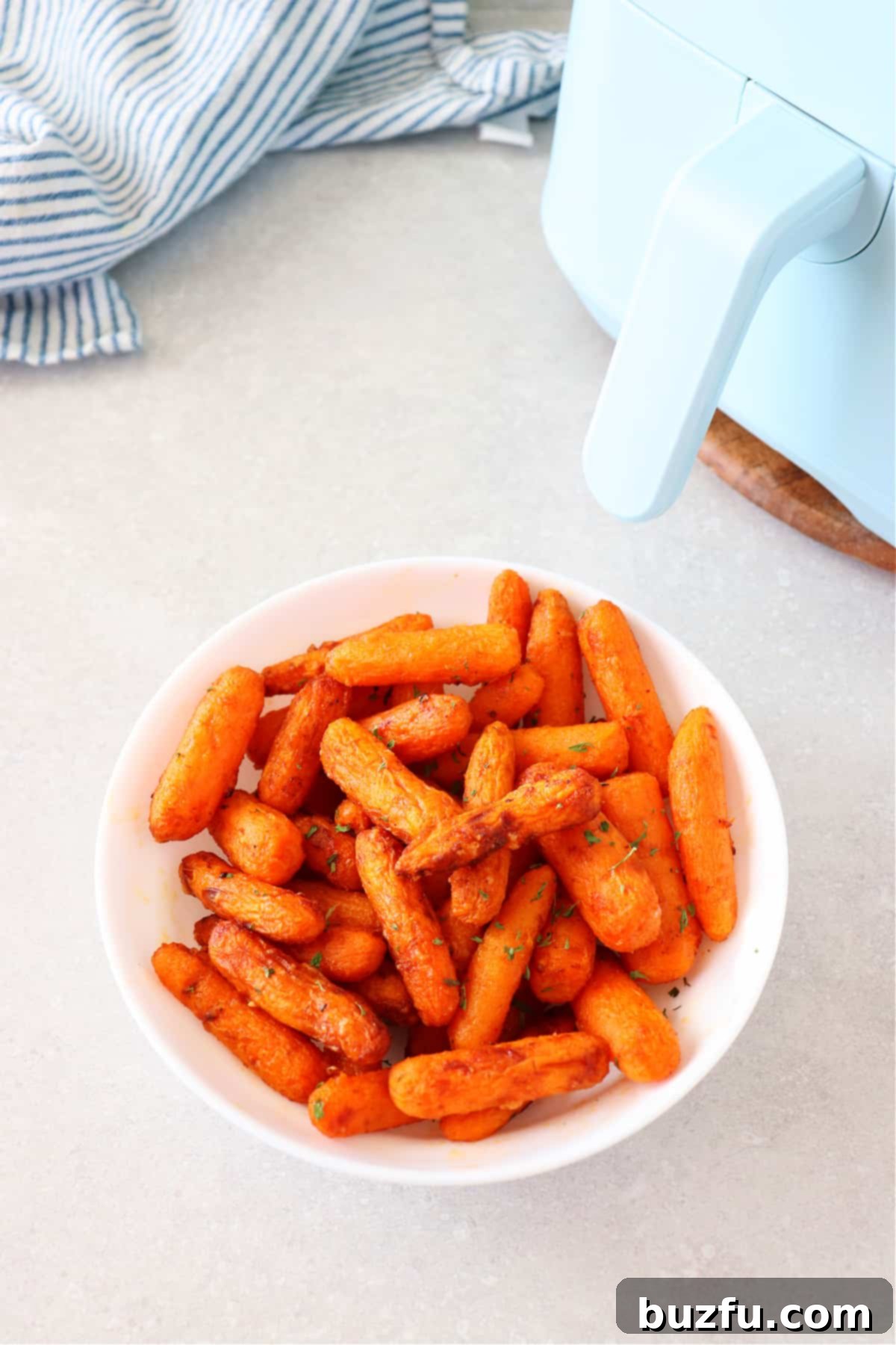 Air fried carrots in a bowl.
