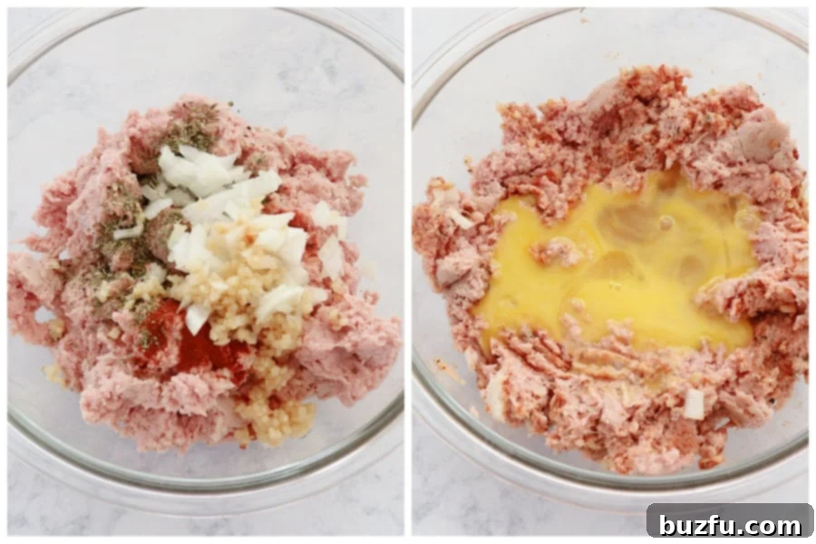 Ground turkey with onion, spices and egg in a glass bowl.