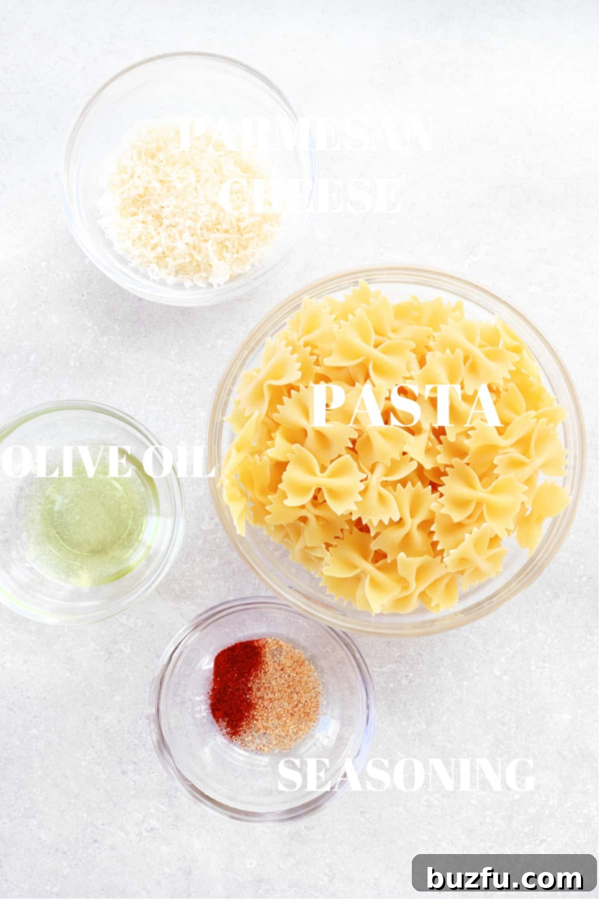 Air Fryer Pasta Chips ingredients. Ingredients for making delicious air fryer pasta chips laid out on a wooden board.