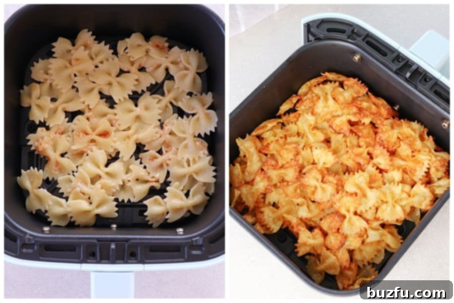 Fry pasta in air fryer. Seasoned pasta arranged in a single layer inside an air fryer basket, ready for cooking.