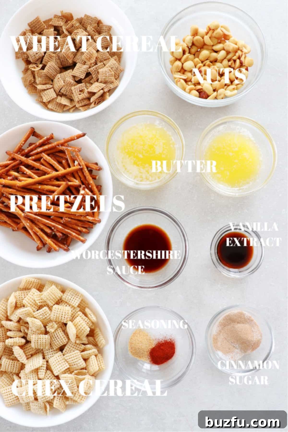 Ingredients for air fryer party mix on a board.