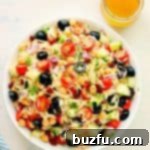 Pasta and veggies in a bowl.