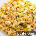 Deviled Egg Macaroni Salad on large white plate.