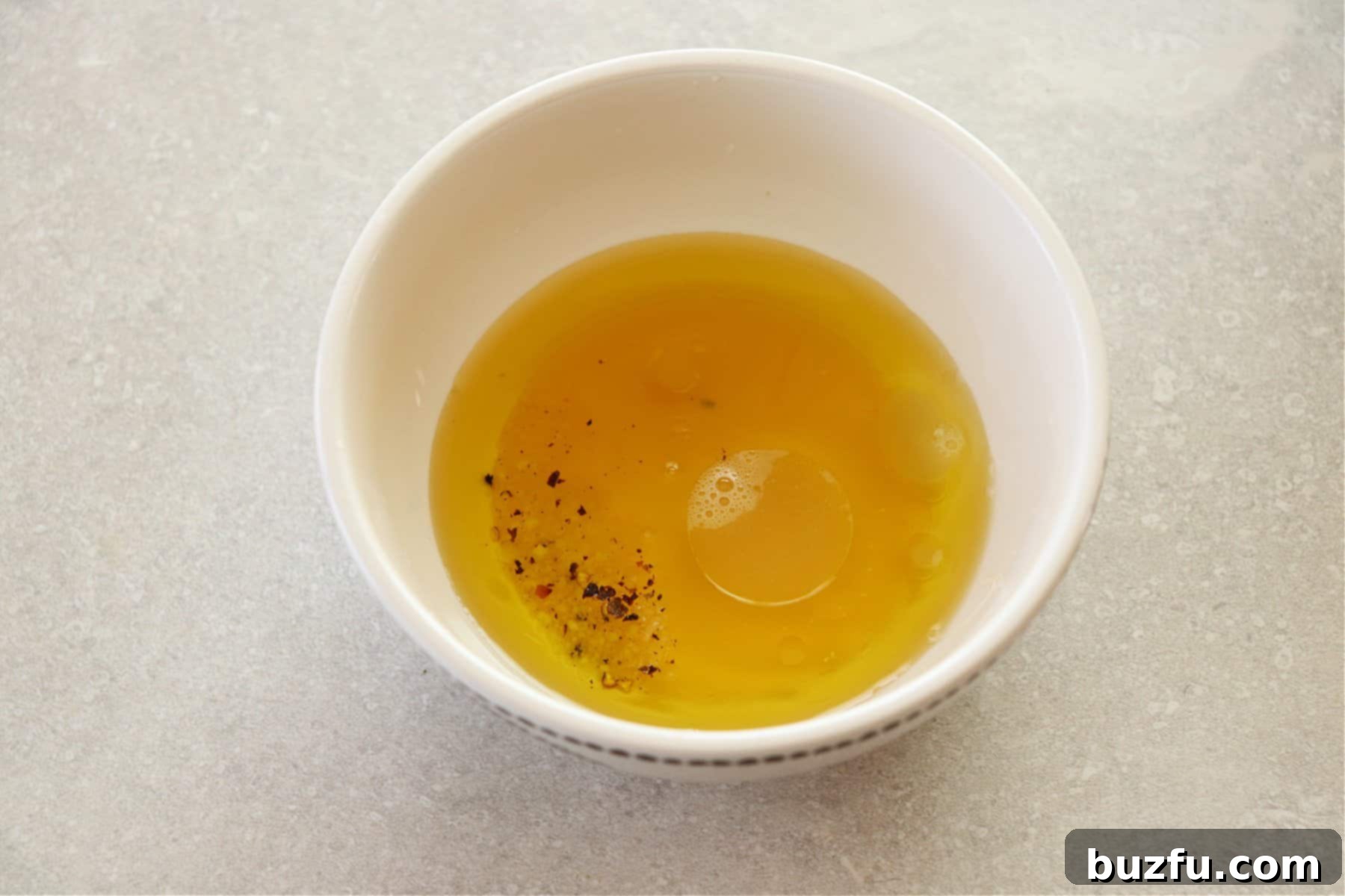 Dressing ingredients in a small bowl.