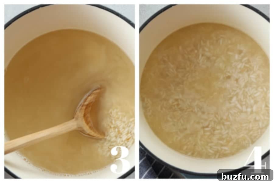 Hot water added to the toasted rice in a pot, starting to boil.