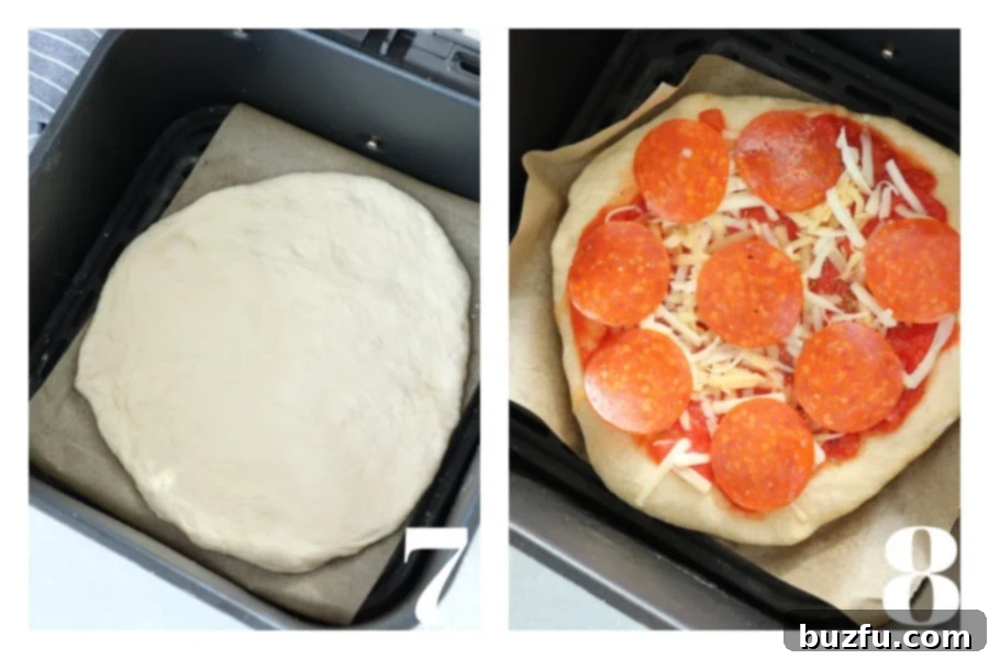 A shaped pizza dough crust baking in the air fryer basket, with another crust topped with rich sauce, melted cheese, and pepperoni, ready for its final cook.