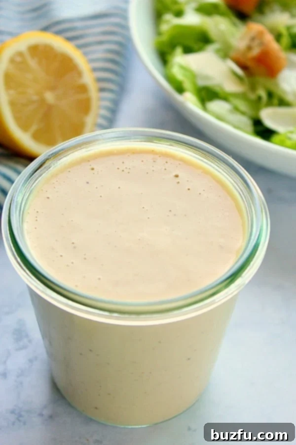 No-Fuss Salad Dressings 4 Salad dressing in a medium glass jar.