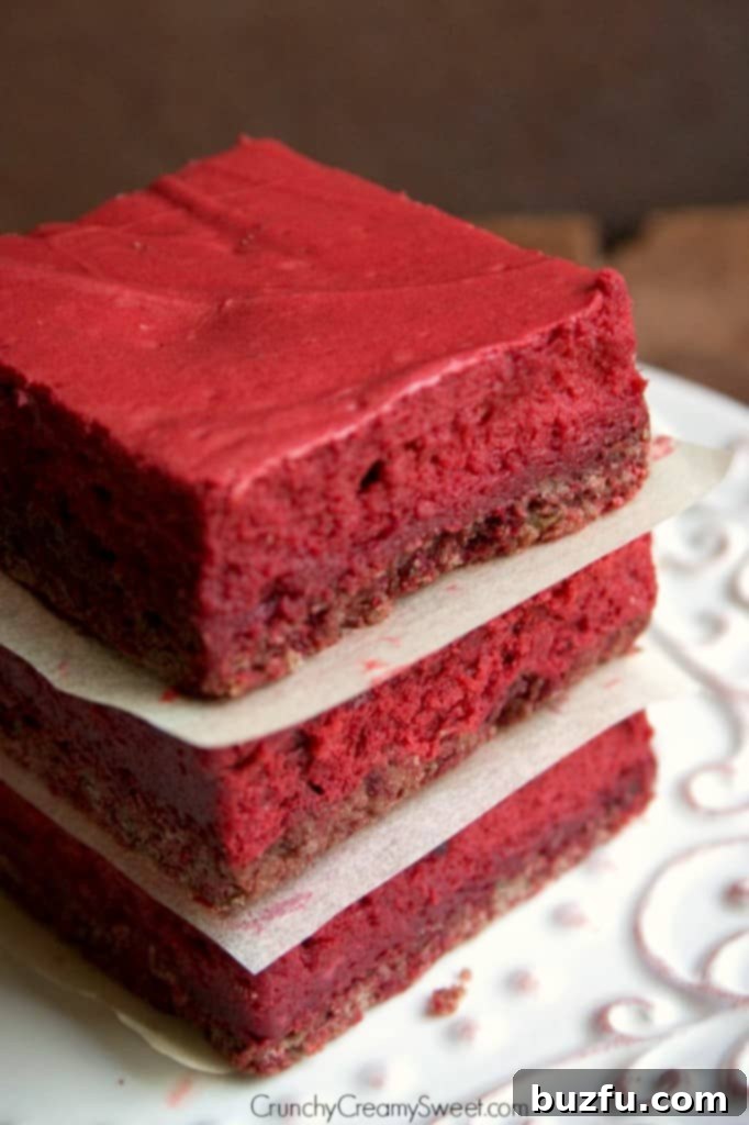 Red Velvet Bars with vibrant red color and creamy texture.