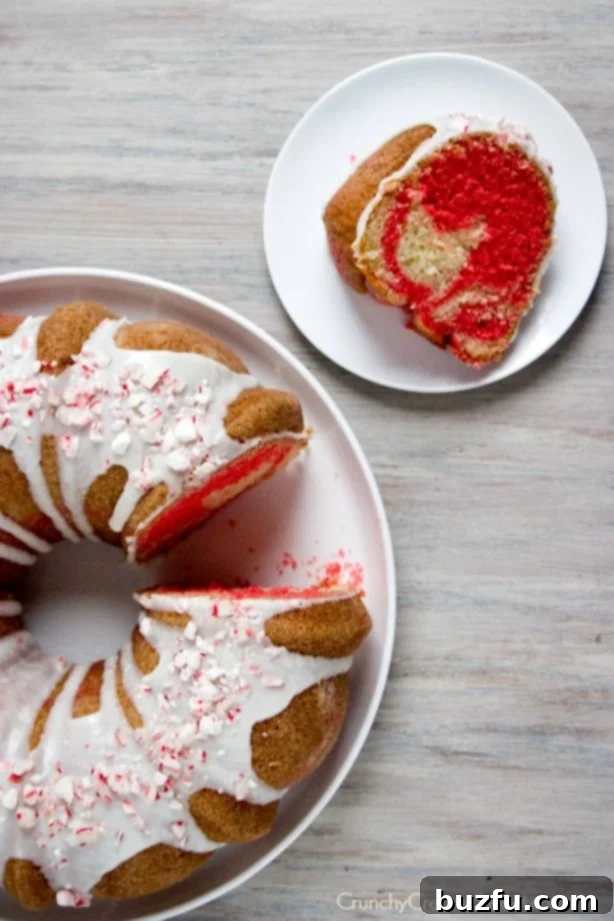 Peppermint Candy Cane Bundt Cake - sweet and light peppermint cake with red swirl is festive and perfect for the holidays! Peppermint Candy Cane Bundt Cake - sweet and light peppermint cake with red swirl is festive and perfect for the holidays!