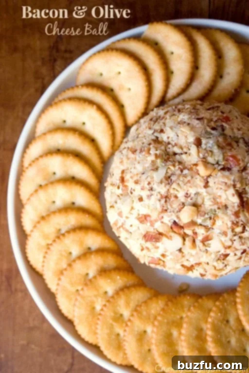 Delicious Bacon and Olive Cheese Ball ready for serving at a party