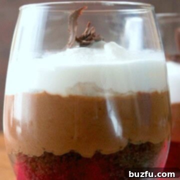 Chocolate Mousse trifle in a serving glass, garnished with chocolate shavings.