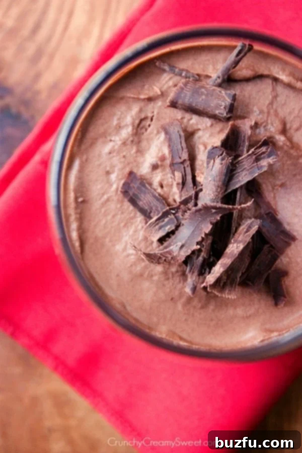 Chocolate Mousse for two served in an elegant glass with chocolate shavings