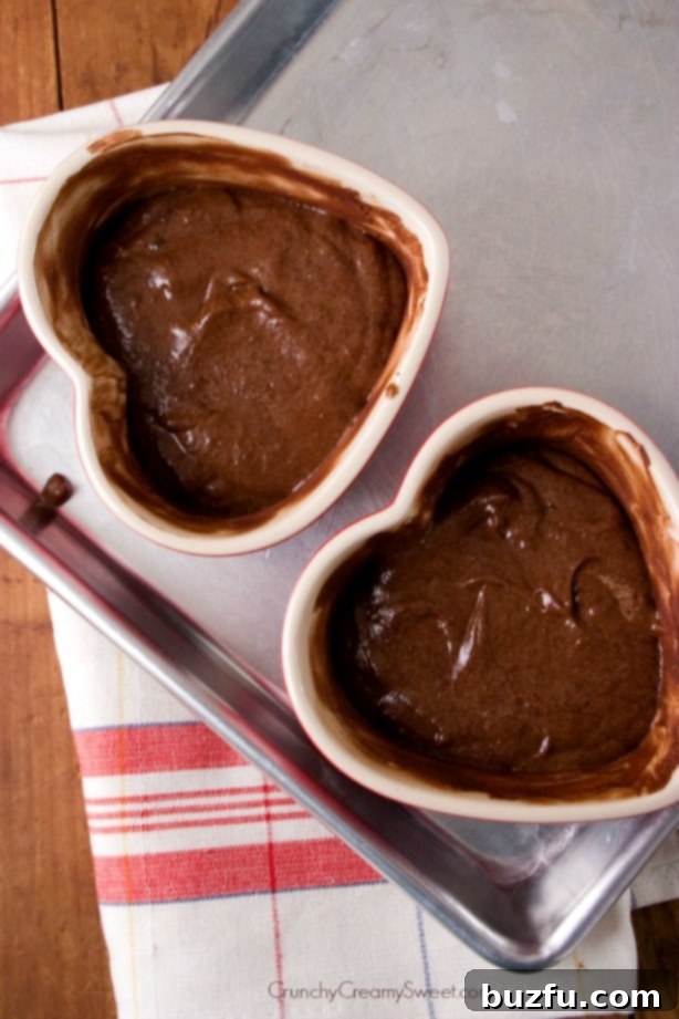 Chocolate cake batter in ramekins