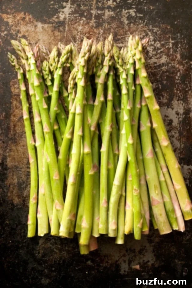 Fresh green asparagus spears, ready for cooking.