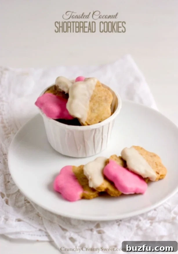 Delicate Chocolate Dipped Coconut Shortbread Cookies, a small treat with immense flavor, made with only 4 ingredients for an easy and delicious recipe.