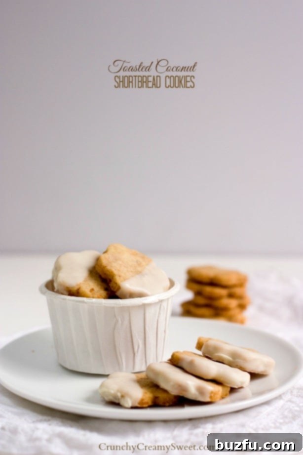 Delicious Chocolate Dipped Coconut Shortbread Cookies cooling on a rack, featuring a delightful tropical flavor and easy 4-ingredient recipe.