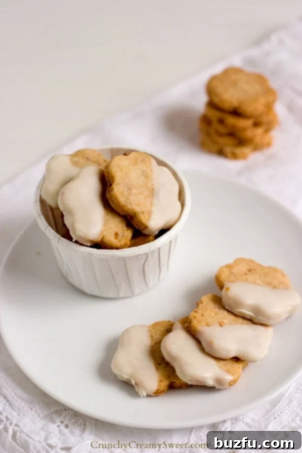 Toasted Coconut Shortbread Cookies with a delicious chocolate dip, highlighting the ease of this 4-ingredient dessert.