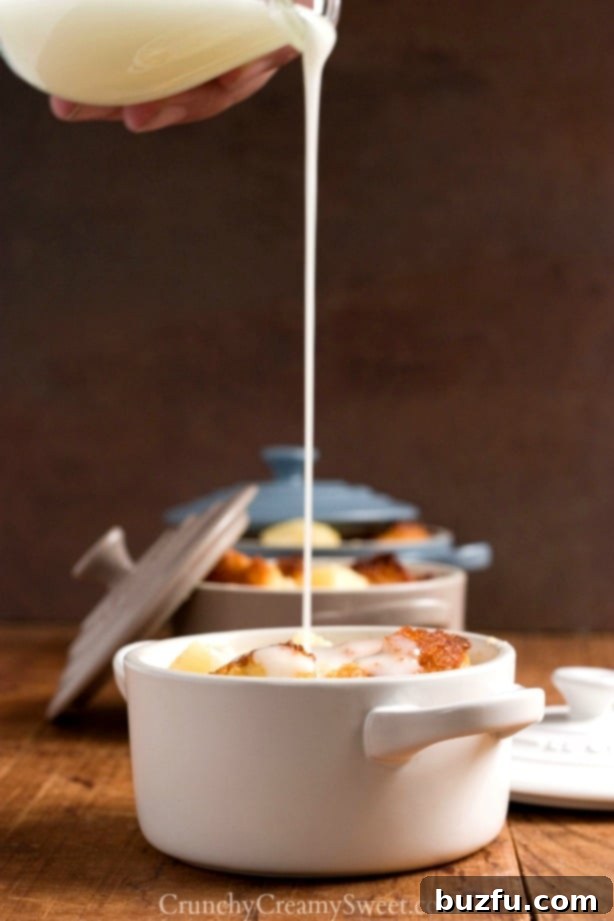 Close-up of Pineapple Apricot Bread Pudding, showcasing its golden crust and fruity texture.