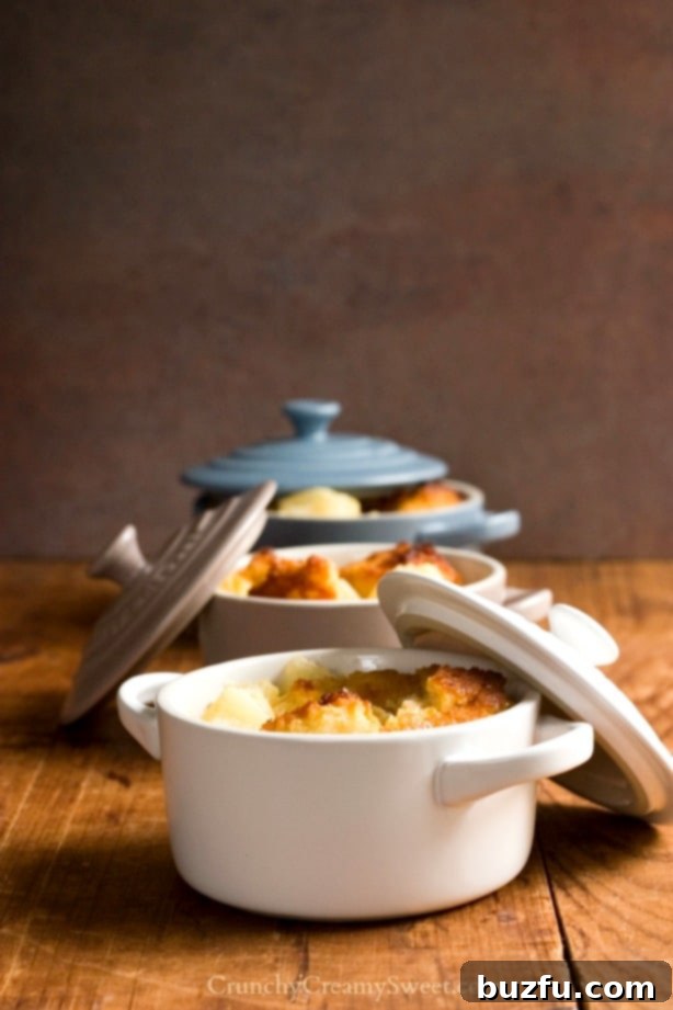 Freshly baked Pineapple Bread Pudding, ready to be served from crunchycreamysweet.com.