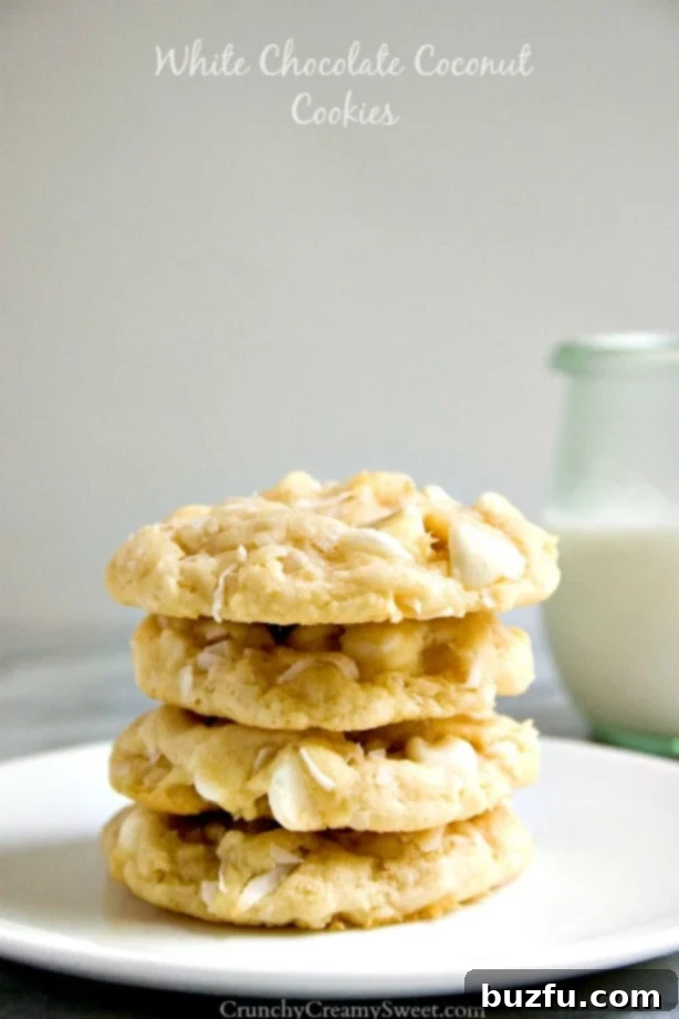 White Chocolate Coconut Cookies - soft sugar cookies packed with white chocolate and coconut. They melt in your mouth!