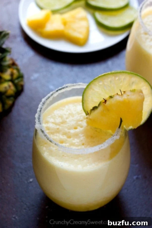 Fresh Pineapple Margarita - super refreshing with a tropical twist, perfect for summer.