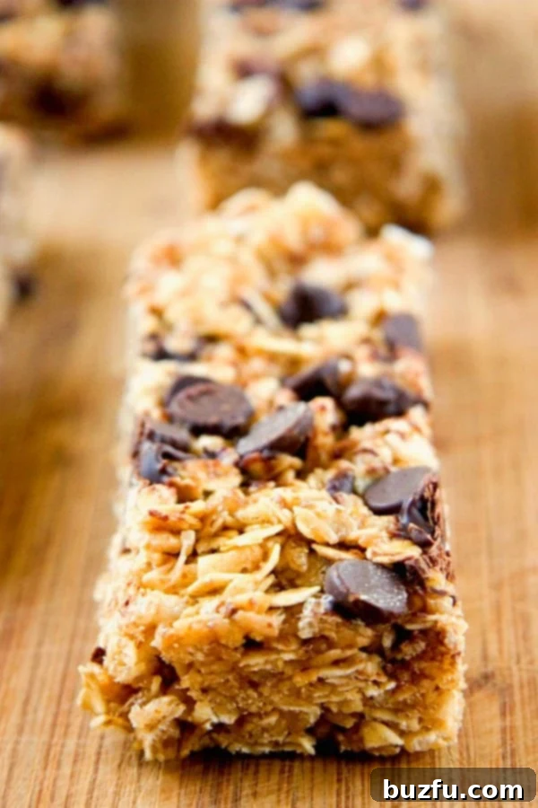 Rows of deliciously chewy peanut butter chocolate chip granola bars, perfectly cut and ready to enjoy.