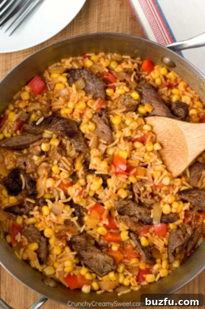 Fiesta Fried Rice, a quick and easy one-pot dinner solution with vibrant Mexican flavors.