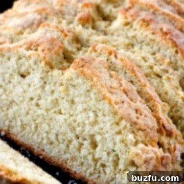 Golden Skillet Parmesan Ranch Bread 2 Sliced Parmesan Ranch Bread in a skillet.
