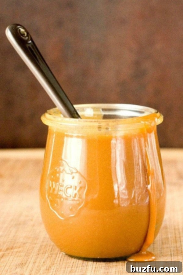 Gourmet Microwave Caramel 2 Lustrous Microwave Caramel Sauce in a glass jar, ready for drizzling.