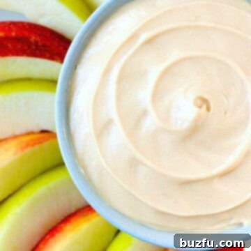 Decadent Caramel Apple Indulgence 2 Caramel Apple Dip in a beautiful bowl, surrounded by apple slices, ready to be served. A perfect fall treat.