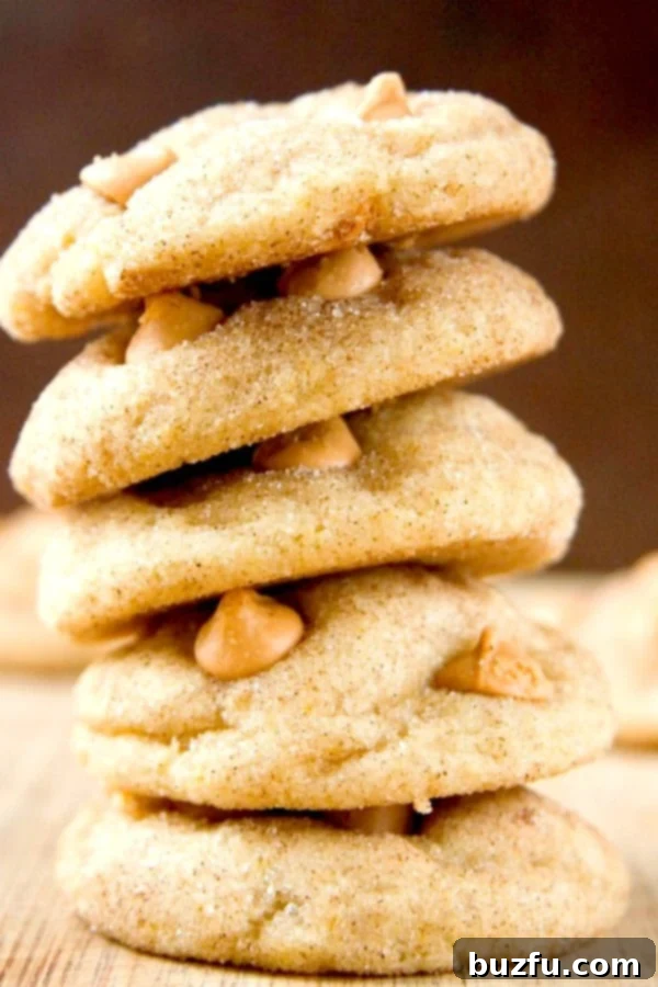 Stack of Soft and Chewy Butterscotch Snickerdoodle Cookies showing their unique crinkles and golden-brown cinnamon sugar coating.