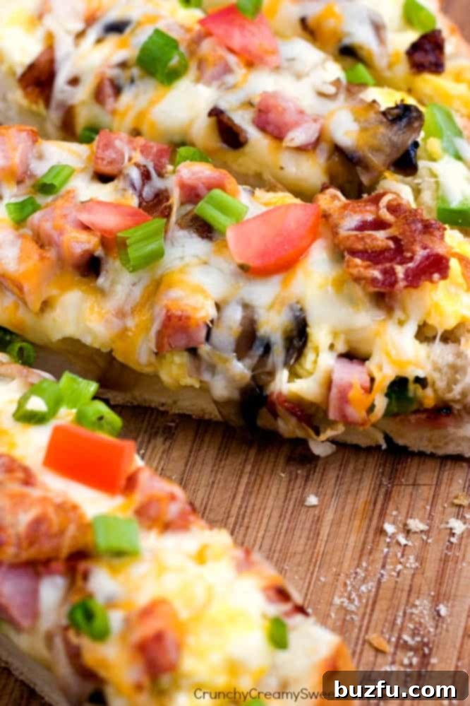 Breakfast Omelet Cheesy Garlic Bread Breakfast Omelet Cheesy Garlic Bread - a delicious and easy recipe for a fun and hearty breakfast or brinner meal.