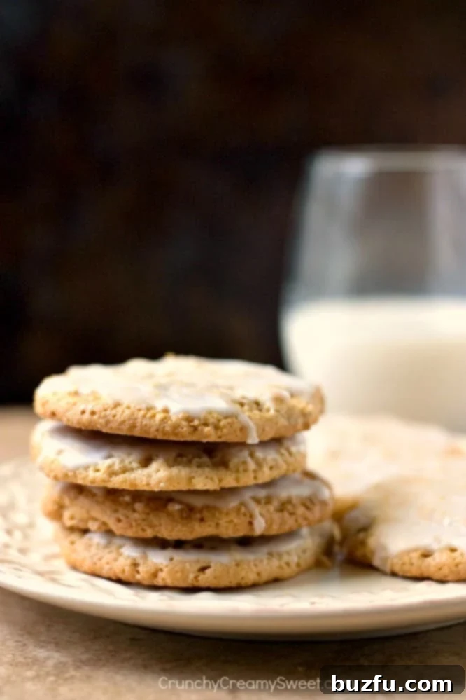 Glazed Oatmeal Cookies cooling on a rack, ready to be served.