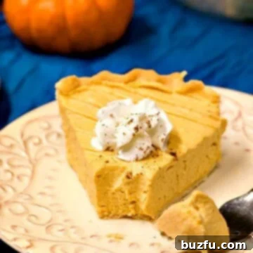 Pumpkin Mousse Pie slice on a plate.