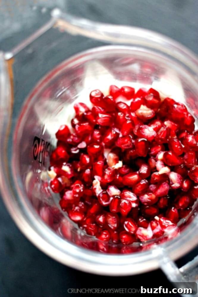 Smoothie with pomegranate and cranberries in a glass