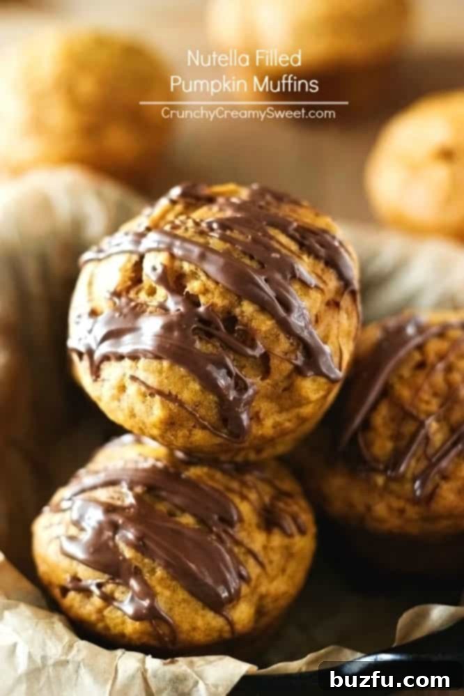 Autumn Spiced Pumpkin Crumble Muffins 7 Soft Nutella Filled Pumpkin Muffins, a sweet and rich fall breakfast.